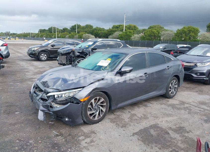 Photo 2 of 2018 Honda Civic EX (VIN 2HGFC2F7XJH595682)