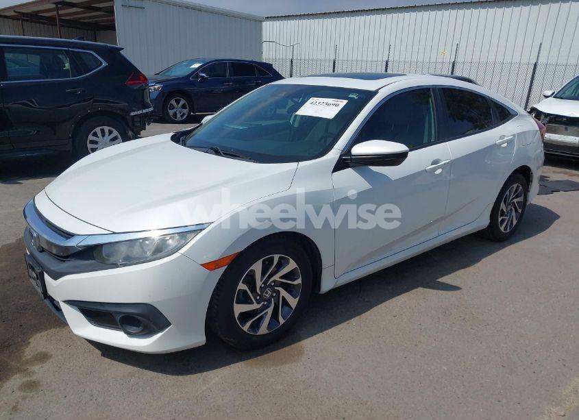 Photo 2 of 2018 Honda Civic EX (VIN 2HGFC2F89JH521002)