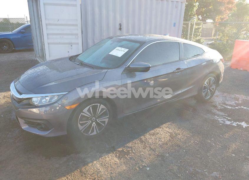 Photo 2 of 2017 Honda Civic EX-T (VIN 2HGFC3B35HH360562)