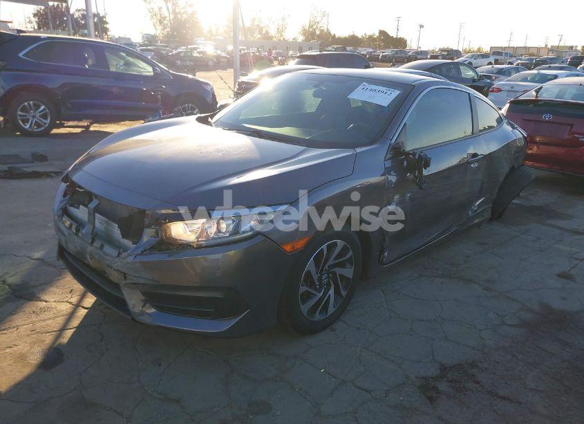 Photo 2 of 2018 Honda Civic LX (VIN 2HGFC4A57JH304153)