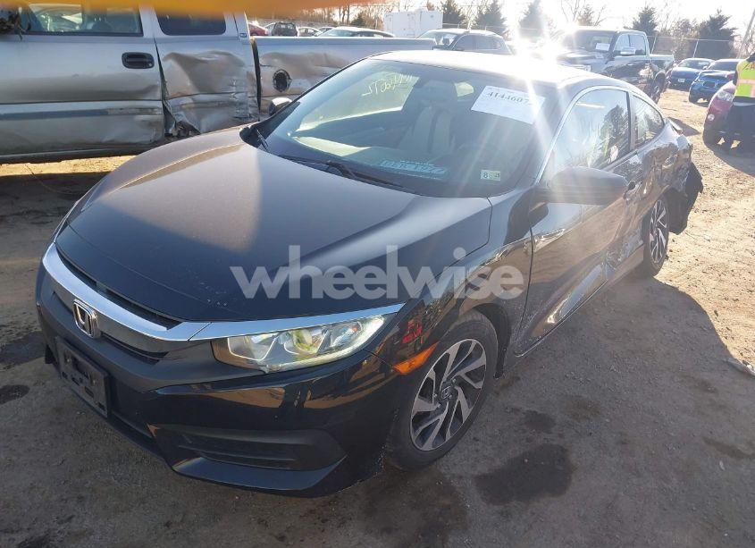 Photo 2 of 2018 Honda Civic LX-P (VIN 2HGFC4B09JH301497)