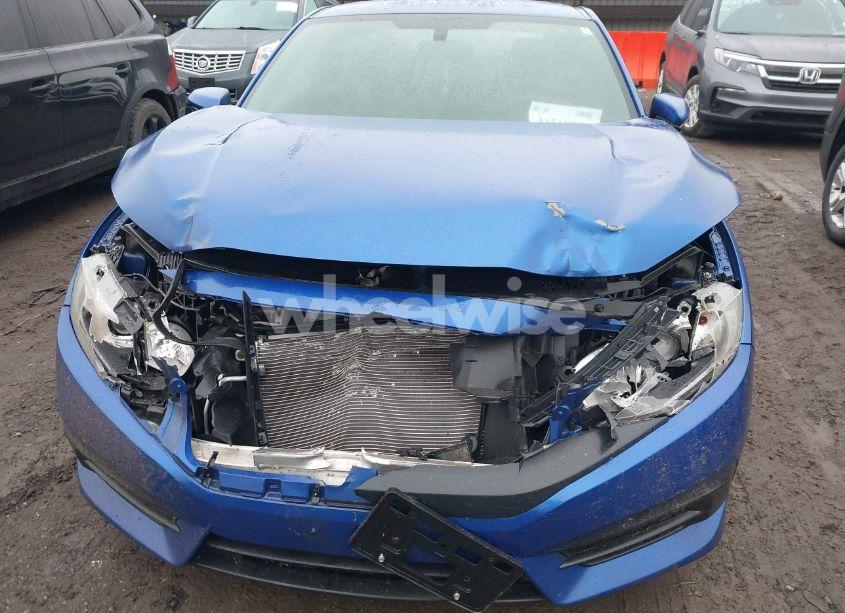 Photo 6 of 2017 Honda Civic LX (VIN 2HGFC4B5XHH310389)
