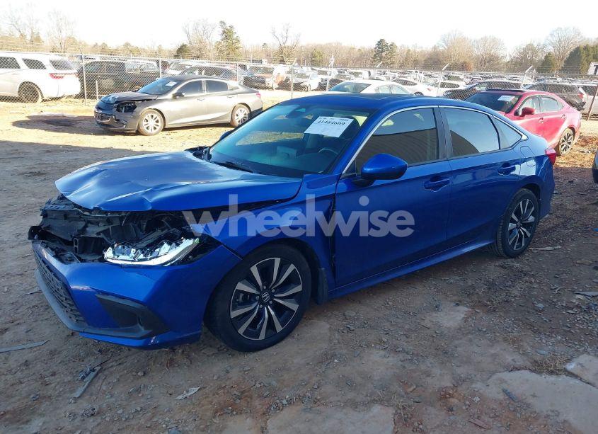Photo 2 of 2022 Honda Civic EX (VIN 2HGFE1F70NH304519)