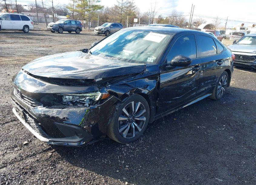 Photo 2 of 2022 Honda Civic EX (VIN 2HGFE1F73NH326434)
