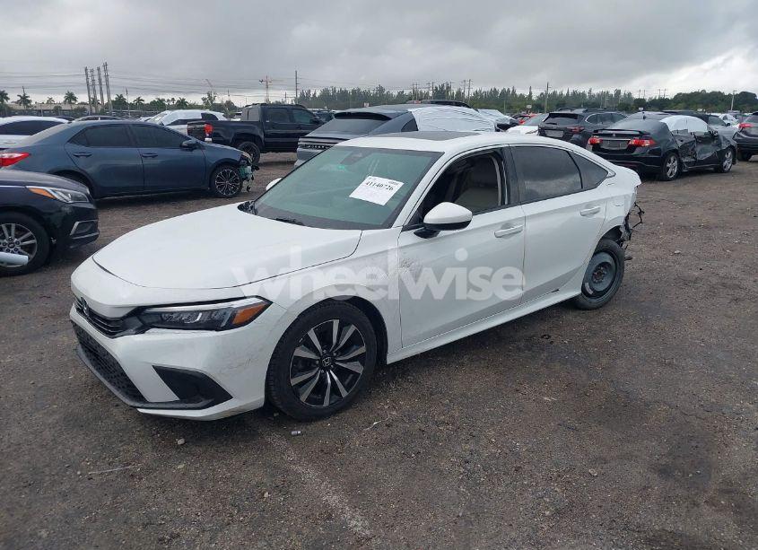 Photo 2 of 2022 Honda Civic EX (VIN 2HGFE1F7XNH323403)