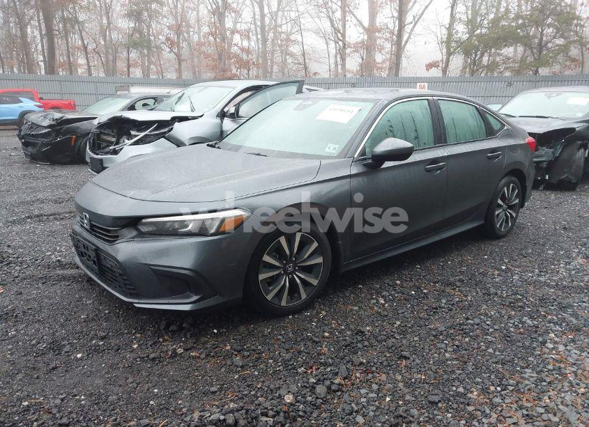 Photo 2 of 2024 Honda Civic EX (VIN 2HGFE1F7XRH335525)