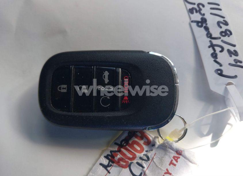 Photo 11 of 2023 Honda Civic TOURING (VIN 2HGFE1F91PH318580)