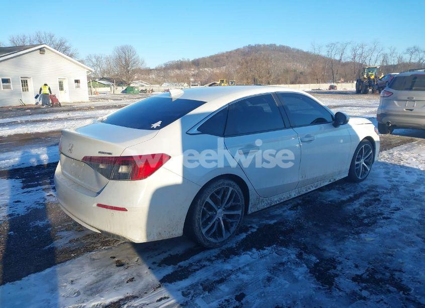 Photo 4 of 2022 Honda Civic TOURING (VIN 2HGFE1F93NH306010)