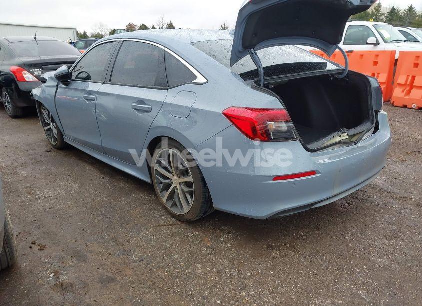 Photo 3 of 2022 Honda Civic TOURING (VIN 2HGFE1F93NH317542)