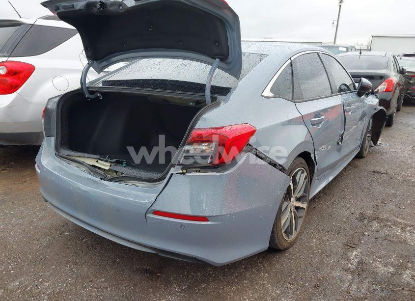 Photo 4 of 2022 Honda Civic TOURING (VIN 2HGFE1F93NH317542)