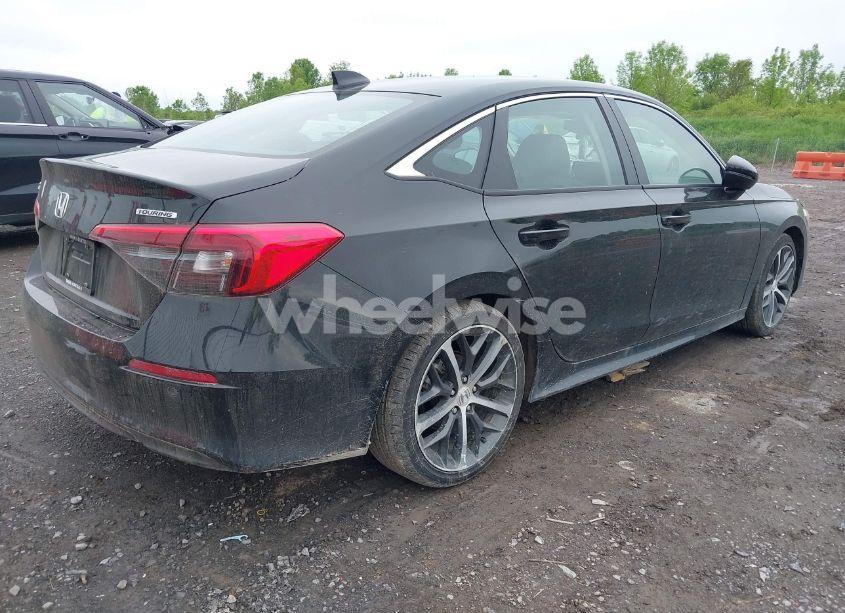 Photo 4 of 2024 Honda Civic TOURING (VIN 2HGFE1F93RH310841)