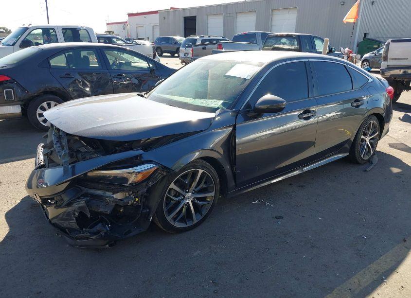 Photo 2 of 2022 Honda Civic TOURING (VIN 2HGFE1F94NH322832)