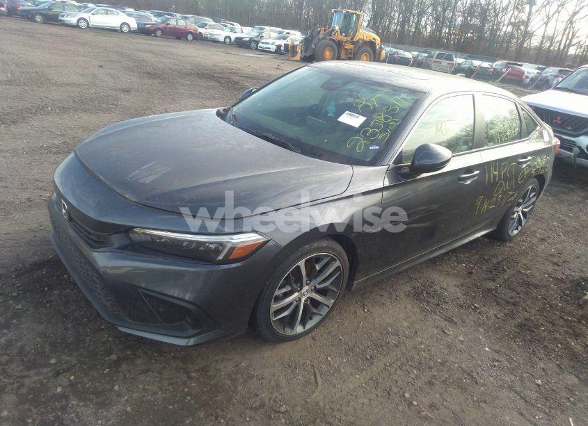 Photo 2 of 2022 Honda Civic TOURING (VIN 2HGFE1F95NH306297)