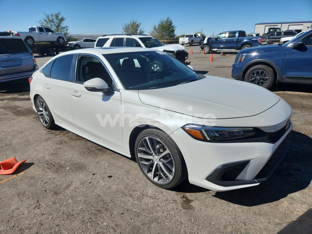 Photo 4 of 2024 HONDA CIVIC TOURING (VIN 2HGFE1F95RH300425)