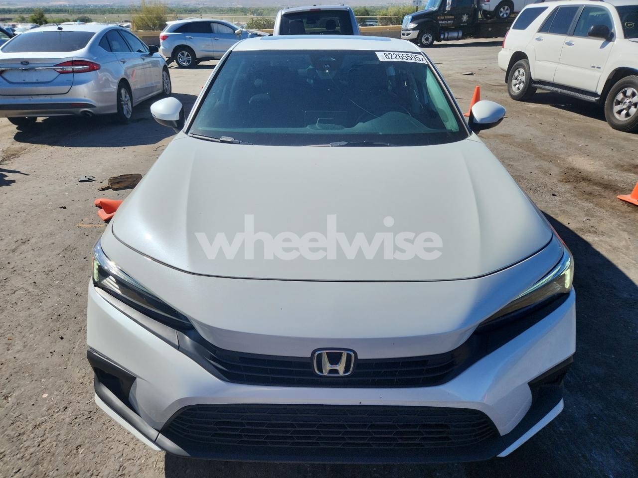 Photo 5 of 2024 HONDA CIVIC TOURING (VIN 2HGFE1F95RH300425)