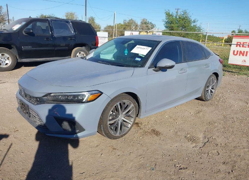 Photo 2 of 2022 Honda Civic TOURING (VIN 2HGFE1F97NH311582)