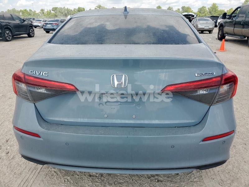 Photo 2 of 2022 HONDA CIVIC TOURING (VIN 2HGFE1F98NH327127)