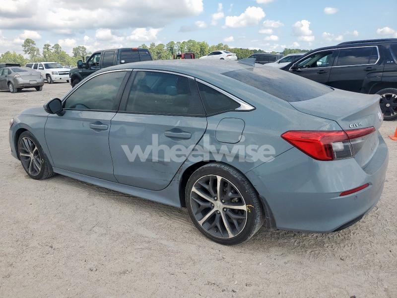Photo 7 of 2022 HONDA CIVIC TOURING (VIN 2HGFE1F98NH327127)