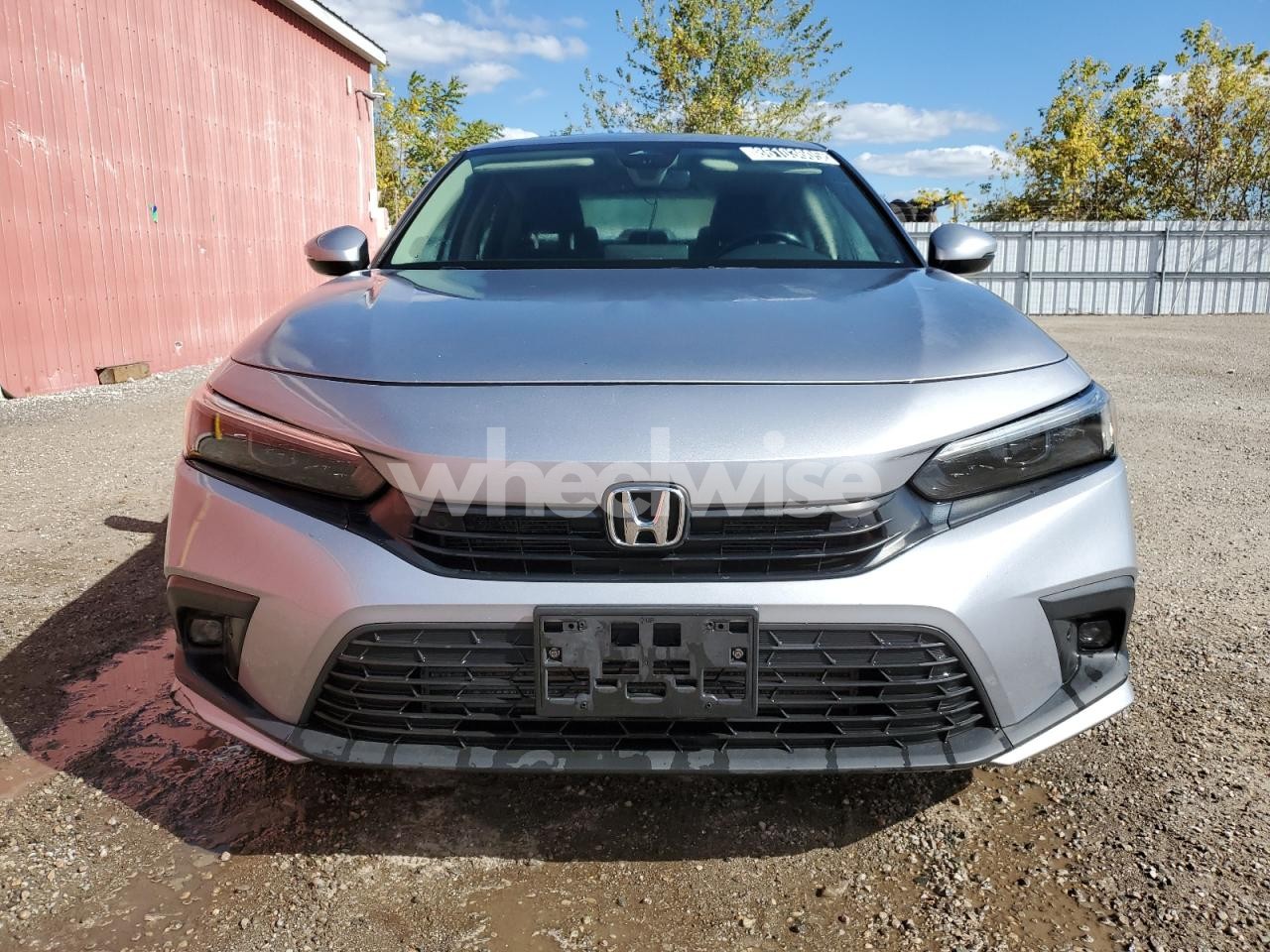 Photo 5 of 2022 HONDA CIVIC TOURING (VIN 2HGFE1F99NH003443)