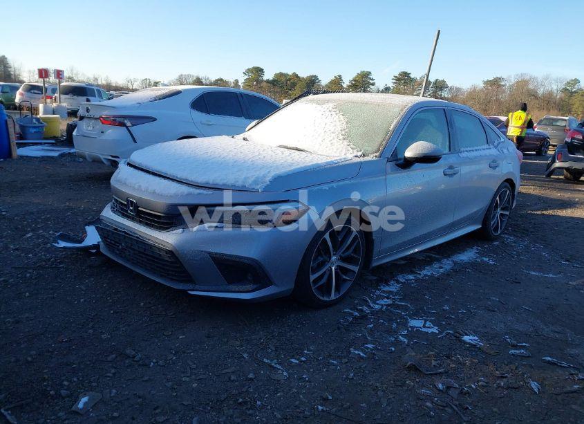 Photo 2 of 2022 Honda Civic TOURING (VIN 2HGFE1F99NH300034)