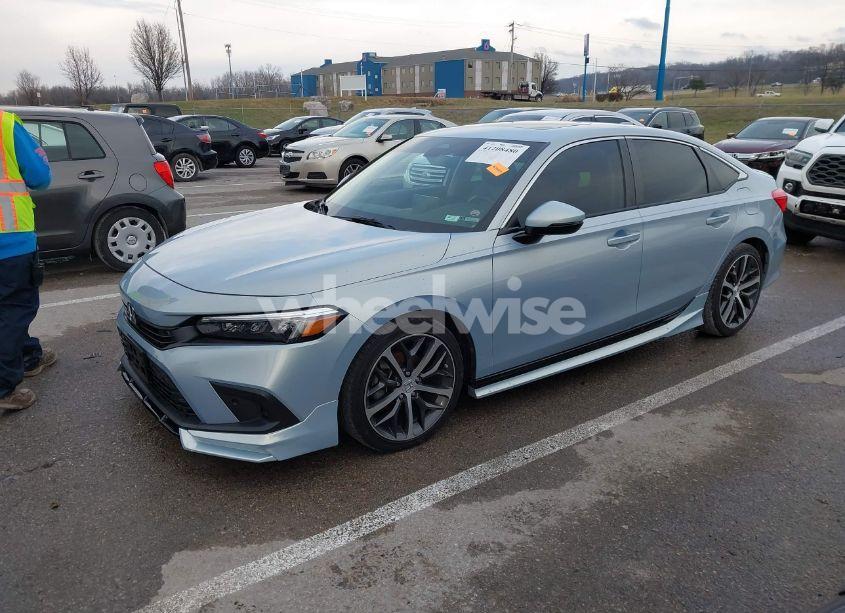 Photo 2 of 2022 Honda Civic TOURING (VIN 2HGFE1F99NH306559)