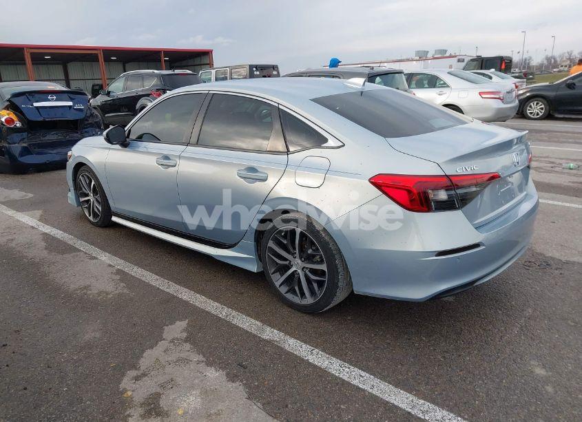 Photo 3 of 2022 Honda Civic TOURING (VIN 2HGFE1F99NH306559)