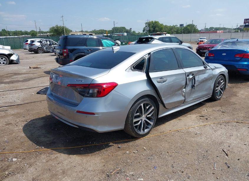 Photo 4 of 2022 Honda Civic TOURING (VIN 2HGFE1F99NH320039)