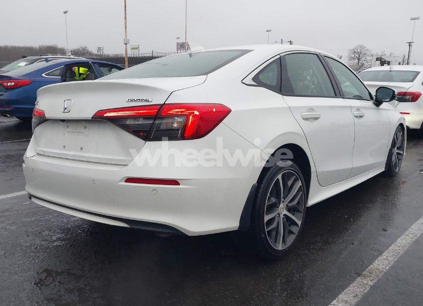 Photo 4 of 2023 Honda Civic TOURING (VIN 2HGFE1F99PH304734)