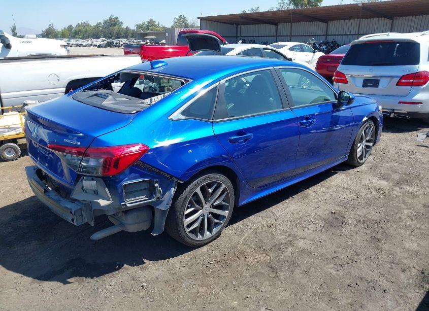 Photo 4 of 2022 Honda Civic TOURING (VIN 2HGFE1F9XNH308708)