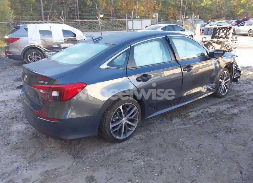 Photo 4 of 2022 Honda Civic TOURING (VIN 2HGFE1F9XNH325444)