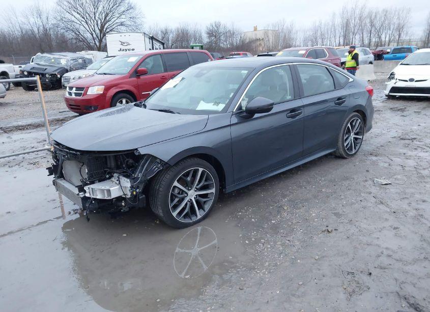 Photo 2 of 2024 Honda Civic TOURING (VIN 2HGFE1F9XRH303546)