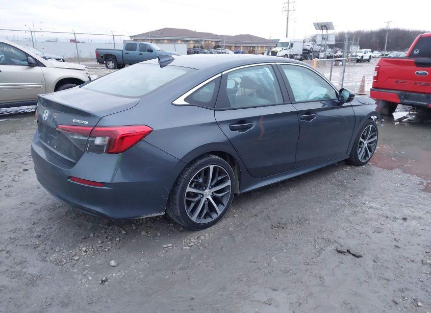 Photo 4 of 2024 Honda Civic TOURING (VIN 2HGFE1F9XRH303546)