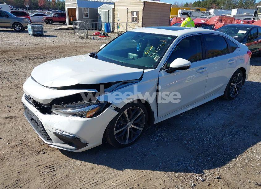 Photo 2 of 2024 Honda Civic TOURING (VIN 2HGFE1F9XRH334862)