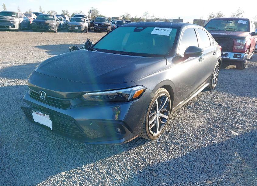 Photo 2 of 2024 Honda Civic TOURING (VIN 2HGFE1F9XRH339883)