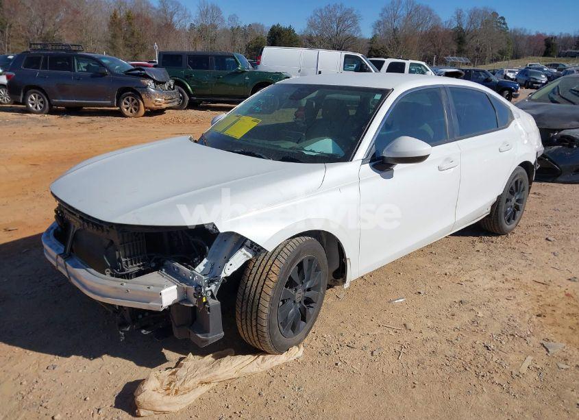 Photo 2 of 2022 Honda Civic LX (VIN 2HGFE2F20NH511258)