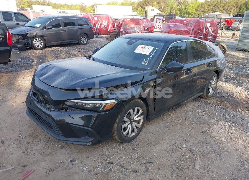 Photo 2 of 2022 Honda Civic LX (VIN 2HGFE2F21NH506473)