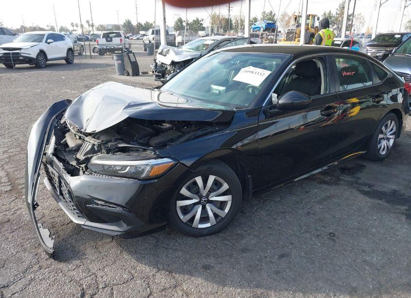 Photo 2 of 2022 Honda Civic LX (VIN 2HGFE2F21NH546620)