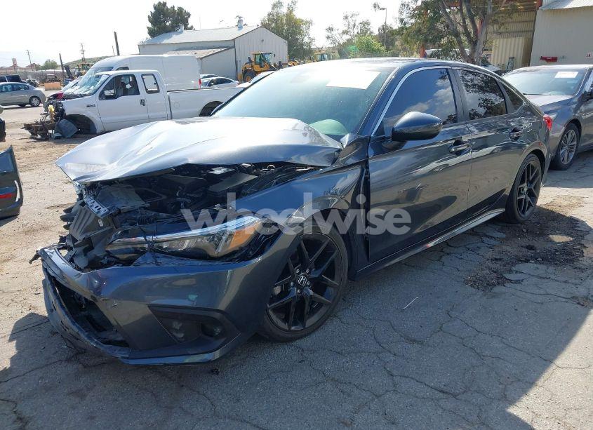 Photo 2 of 2023 Honda Civic LX (VIN 2HGFE2F21PH571679)