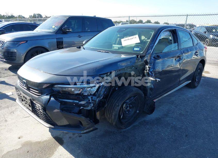 Photo 2 of 2024 Honda Civic LX (VIN 2HGFE2F21RH543528)