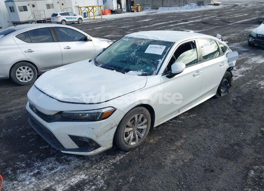 Photo 2 of 2022 Honda Civic LX (VIN 2HGFE2F22NH511729)