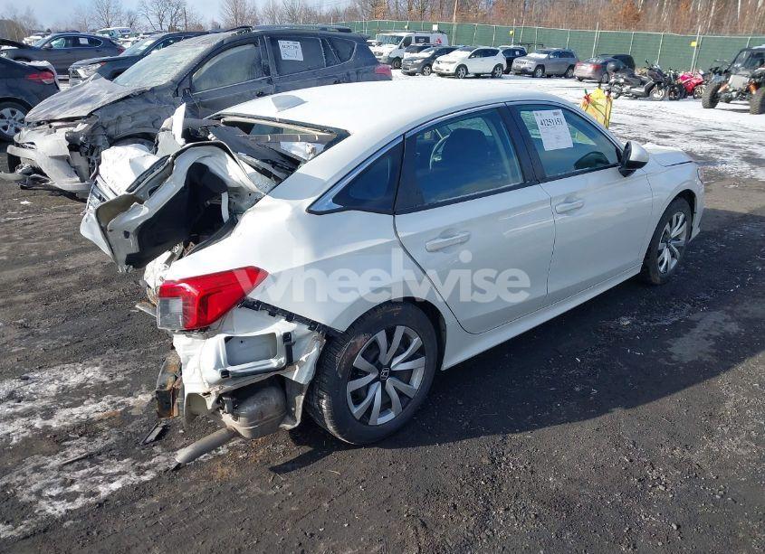 Photo 4 of 2022 Honda Civic LX (VIN 2HGFE2F22NH511729)