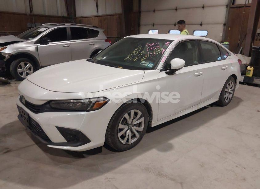 Photo 2 of 2022 Honda Civic LX (VIN 2HGFE2F22NH549199)