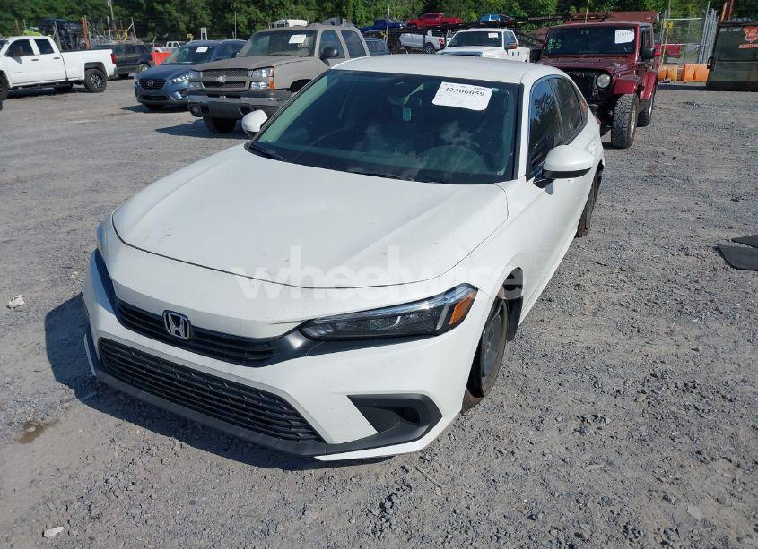 Photo 2 of 2023 Honda Civic LX (VIN 2HGFE2F22PH555099)