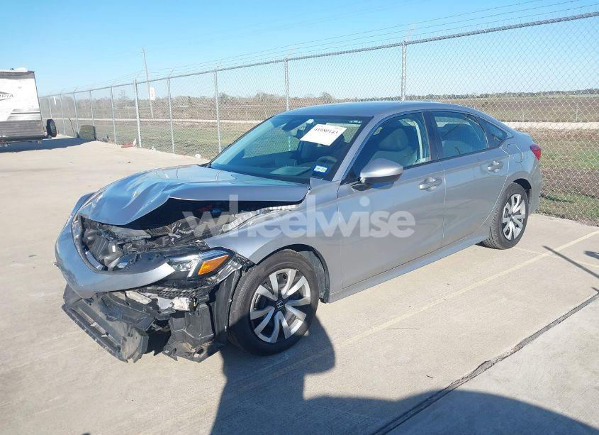 Photo 2 of 2023 Honda Civic LX (VIN 2HGFE2F22PH569312)