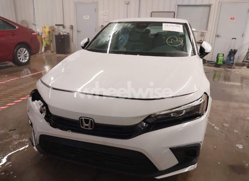 Photo 12 of 2024 Honda Civic LX (VIN 2HGFE2F22RH565392)