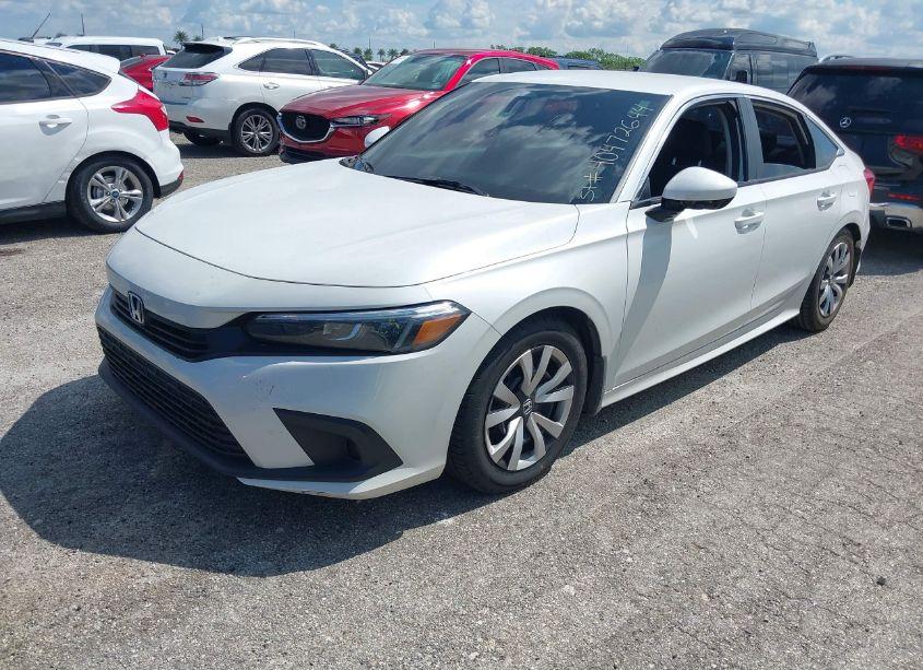 Photo 2 of 2022 Honda Civic LX (VIN 2HGFE2F23NH558445)