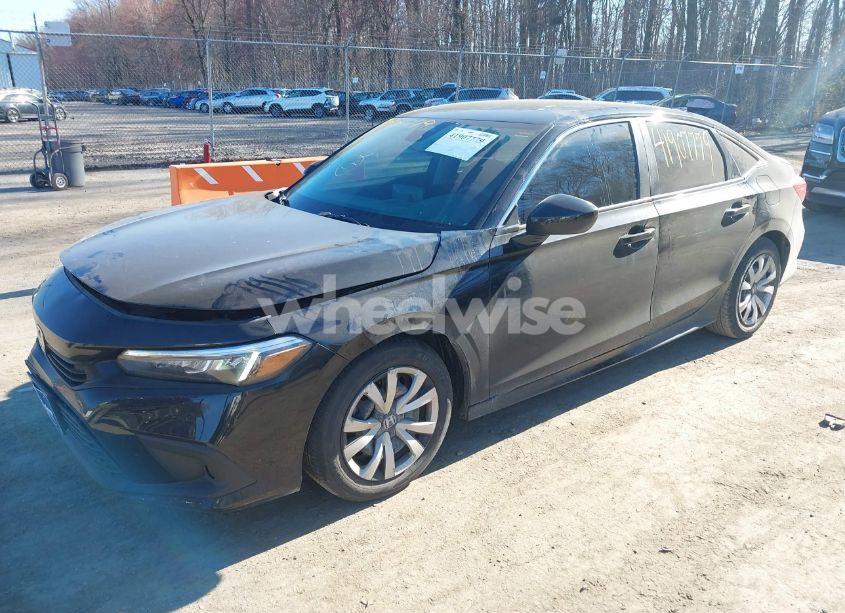 Photo 2 of 2023 Honda Civic LX (VIN 2HGFE2F23PH562045)