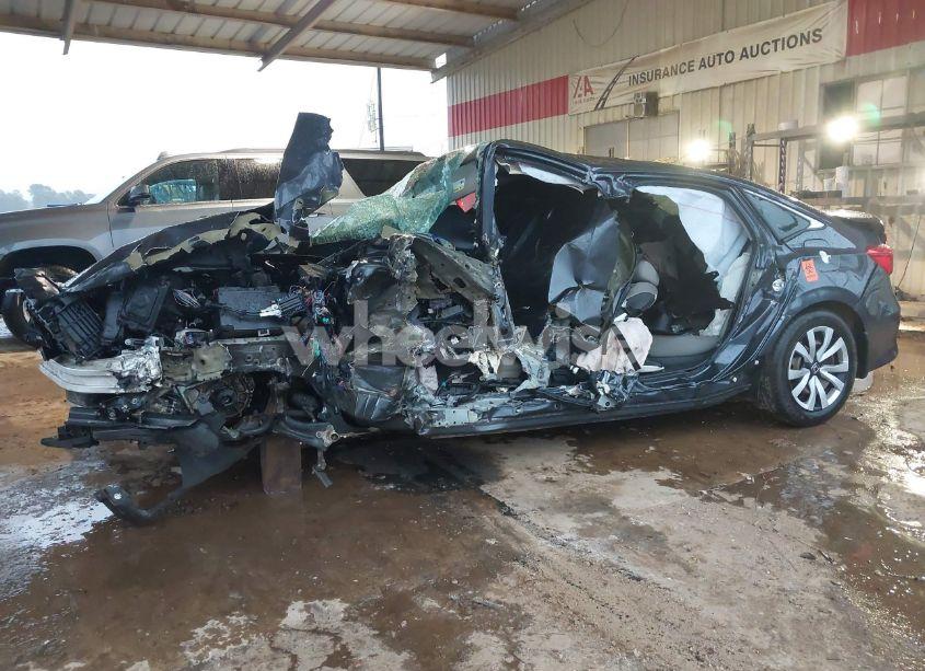 Photo 2 of 2022 Honda Civic LX (VIN 2HGFE2F24NH511165)