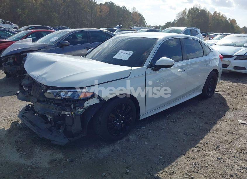 Photo 2 of 2022 Honda Civic LX (VIN 2HGFE2F24NH590420)