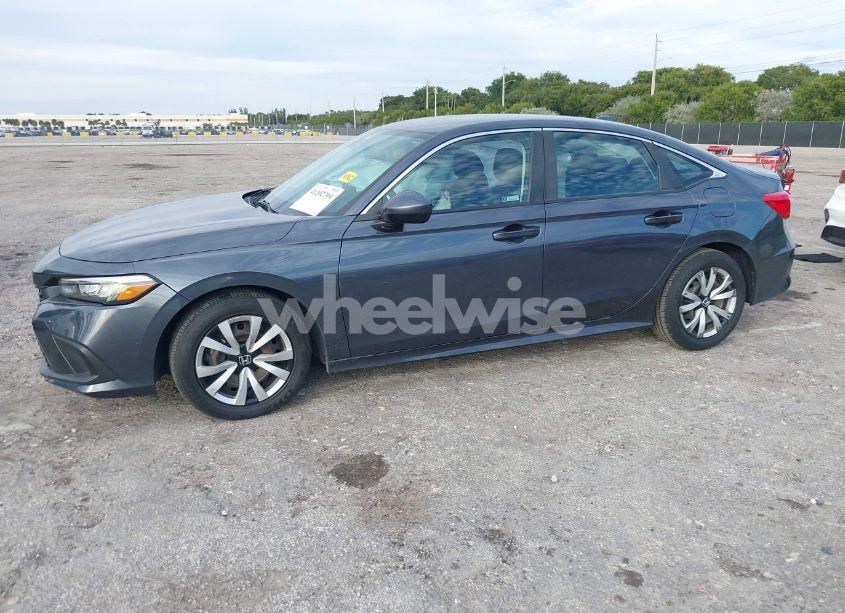 Photo 2 of 2022 Honda Civic LX (VIN 2HGFE2F25NH517802)